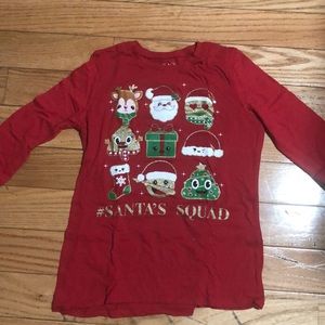 A long sleeve Christmas themed shirt.